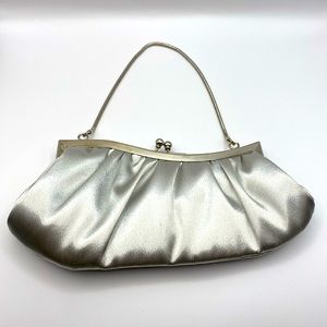 Jeannie Lottie silver satin clutch w/ silver snake strap. BNWOT.